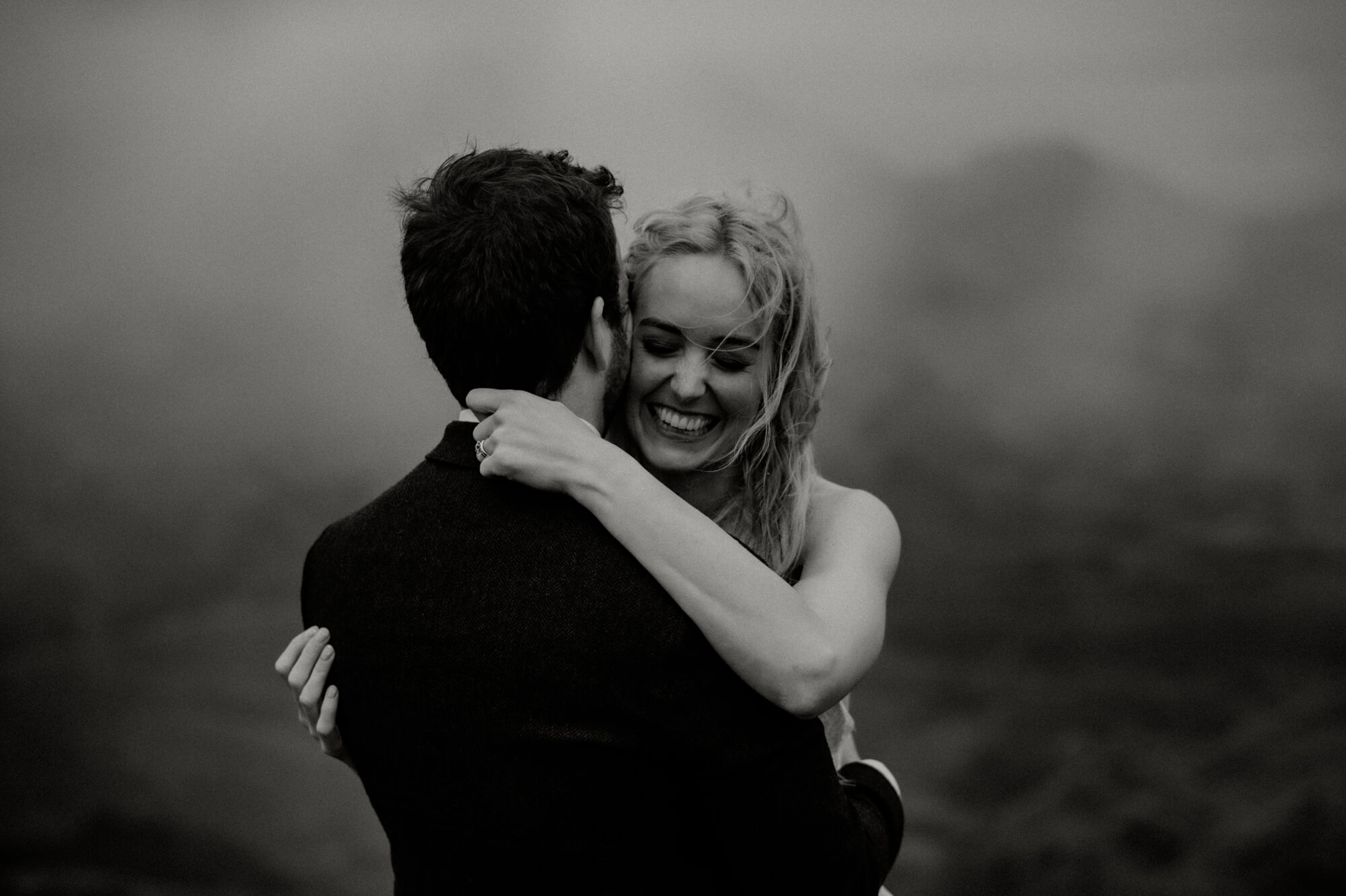 Black and white photo of newly married couple and bride's makeup