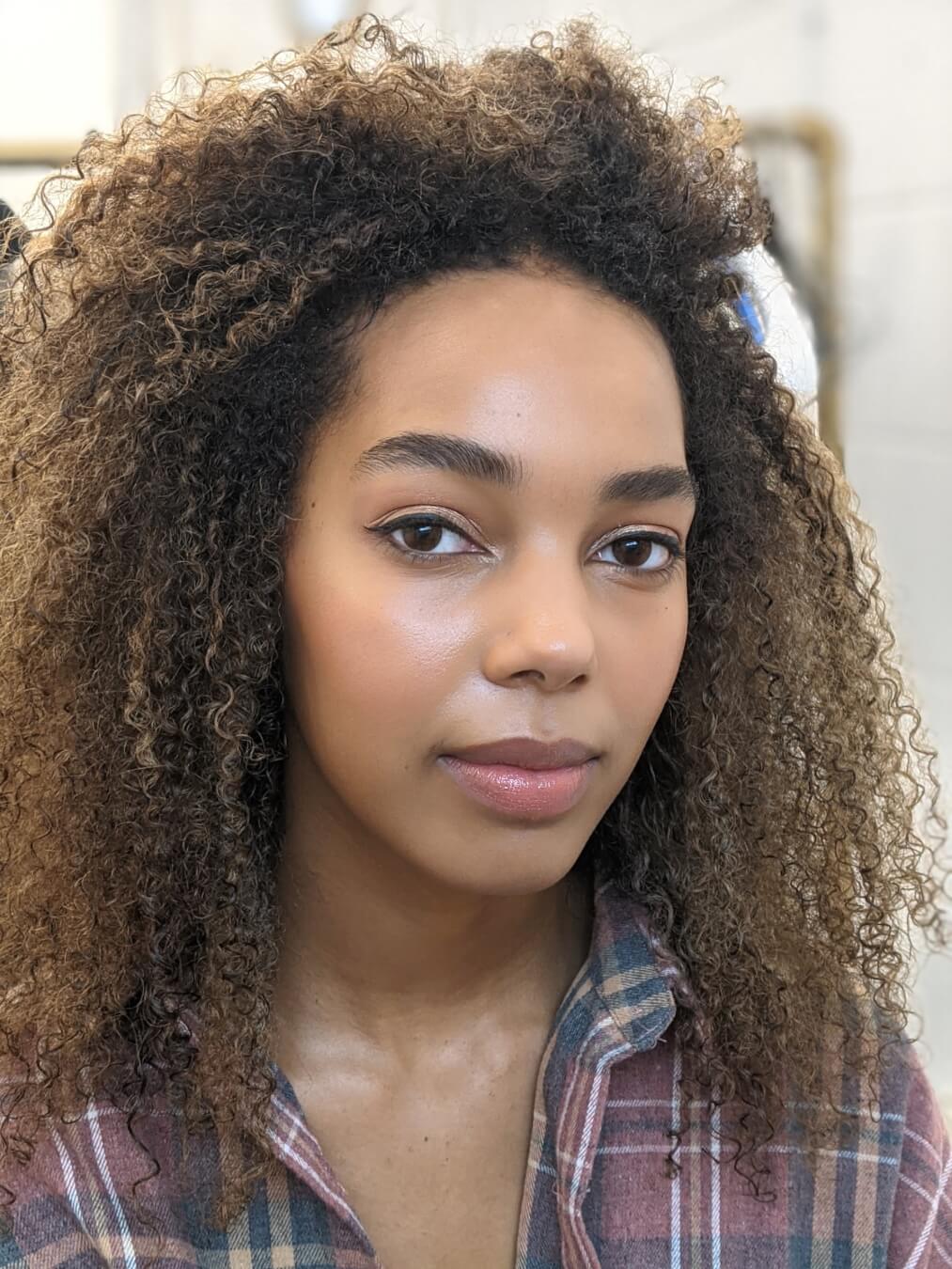 Close-up of professional model with hair and makeup by Bristol makeup artist Evie Smith.