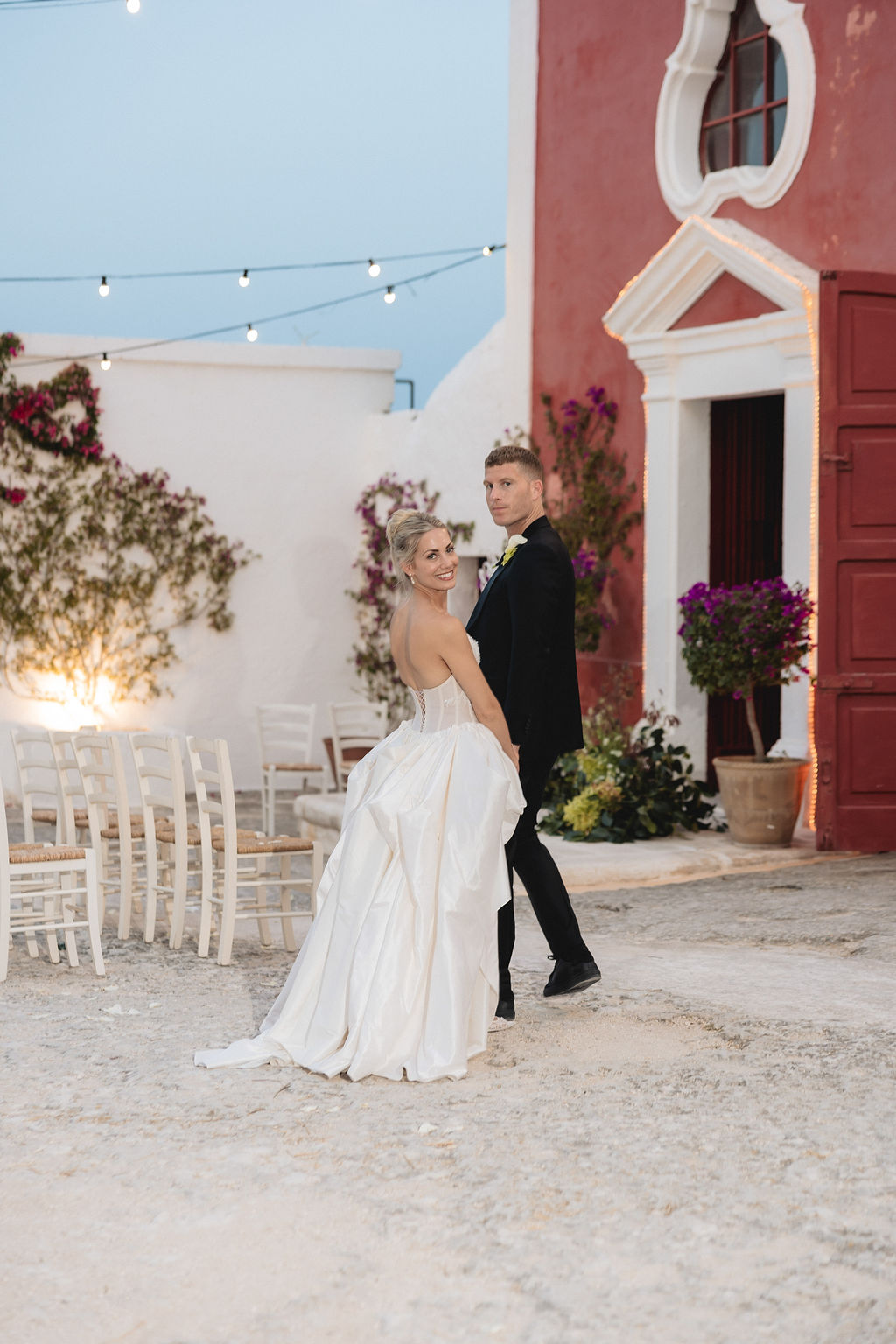 a bride and groom at their destination wedding in Puglia. hair and makeup by uk artist evie smith
